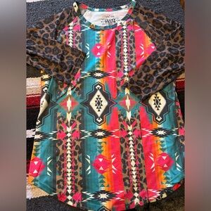 Vibrant Crazy Train Aztec Print Mesh Sleeve Top